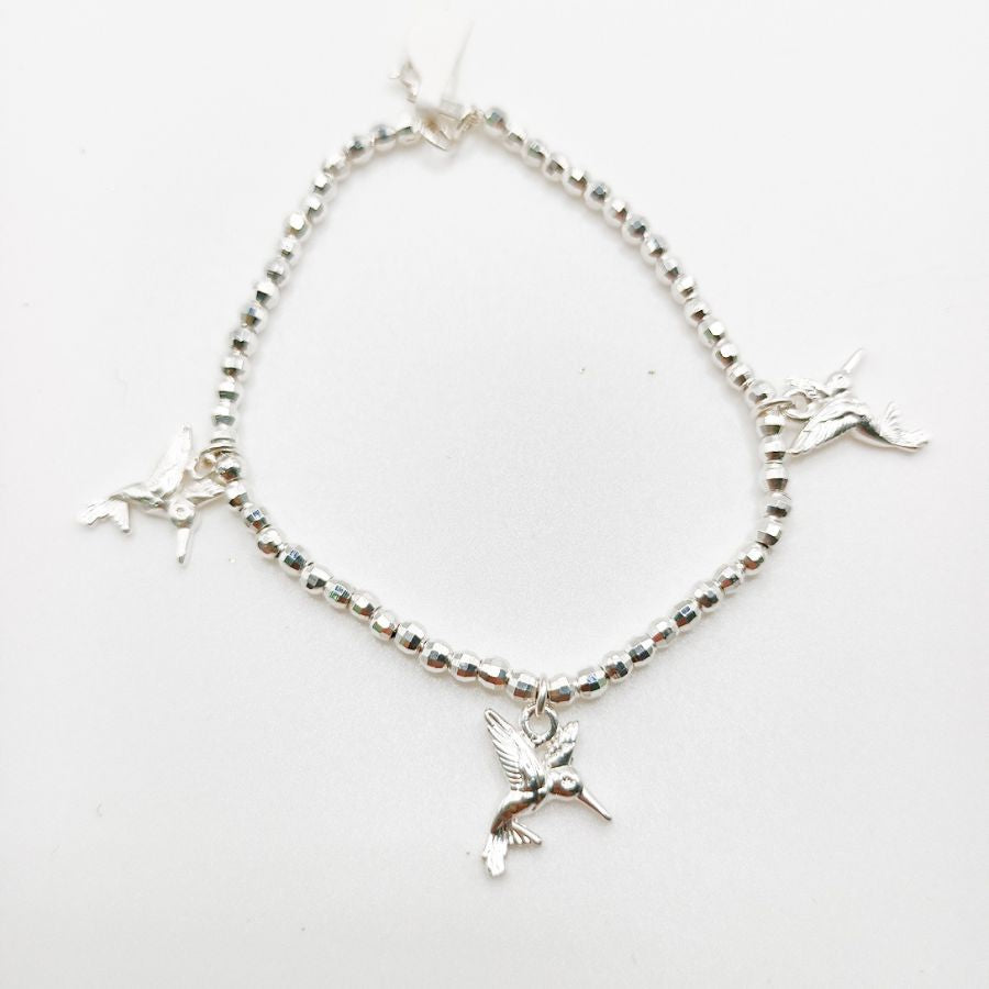Pulsera De Bolitas Facetadas Con Dijes De Colibrí Plata .925